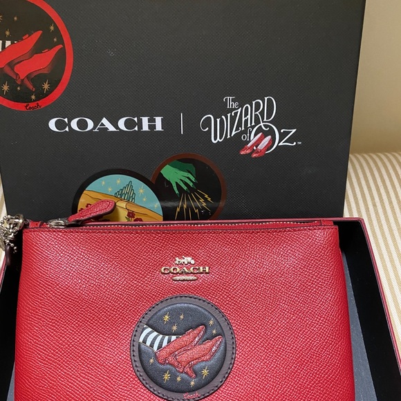 coach wizard of oz wristlet